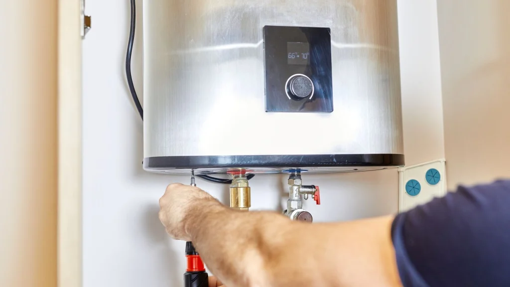 Plumber installing tankless water heater