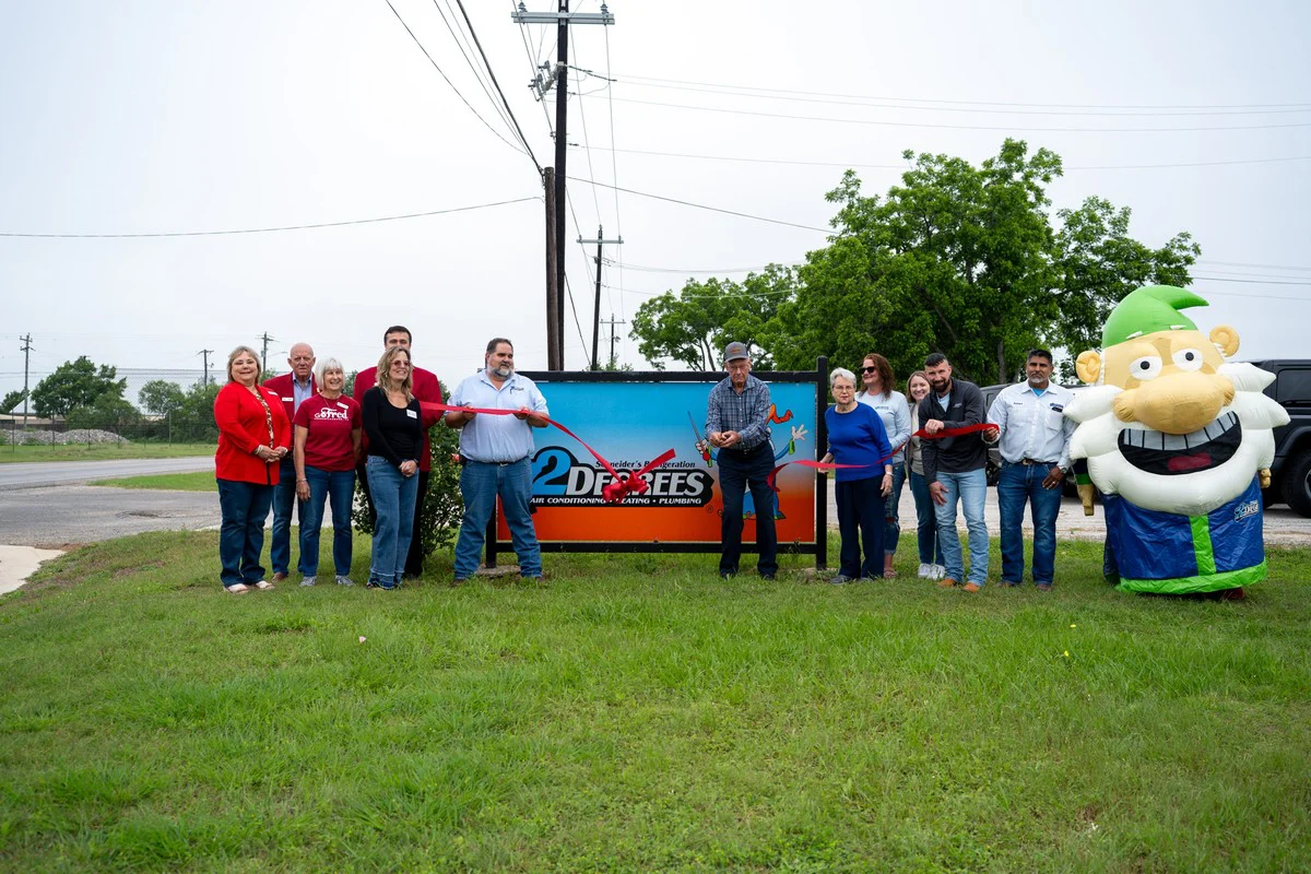 Business Team Celebrates Ribbon Cutting Ceremony - Fredericksburg, TX