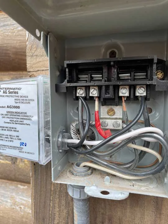 Damaged HVAC disconnect box with melted wiring in Blanco TX home