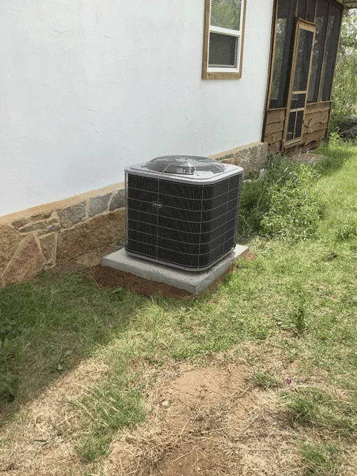 New heat pump condenser installed outside home in Johnson City TX