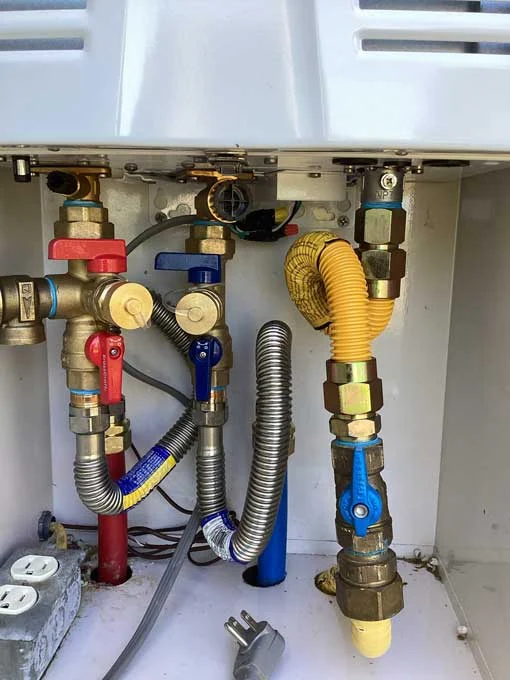 new tankless water heater connections installed for reliable hot water system