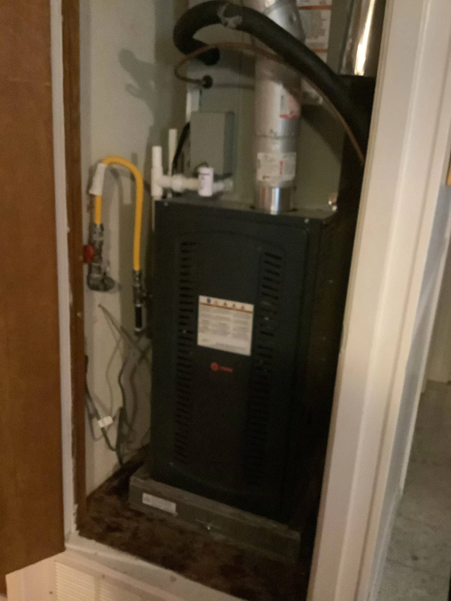 New Trane furnace installed in utility closet