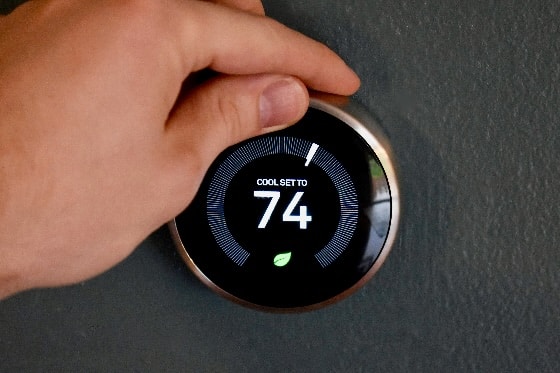A smart thermostat set to 74 degrees