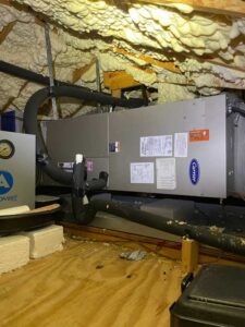 Carrier air handler installed in attic with spray foam insulation
