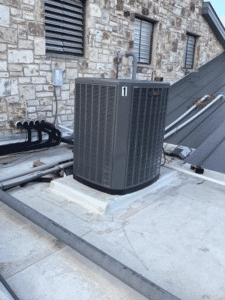 Commercial HVAC condenser installed on rooftop in Kerrville TX church
